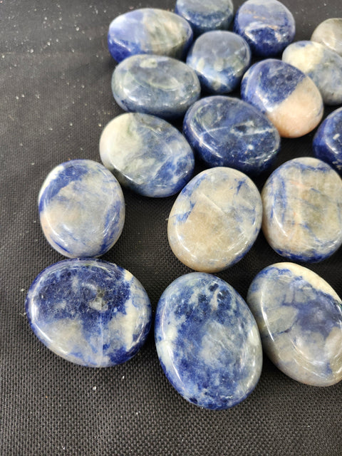 1.5 ounce, 1.75 inch sodalite palm stone uv reactive