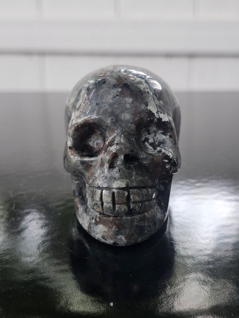 Mini flame stone skull! 5.8 ounces, 2.7 inches long, 2.1 tall