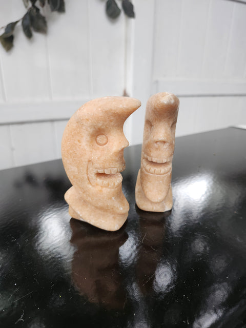 7.4 ounce orange calcite skull faced moon carving! 4 inches