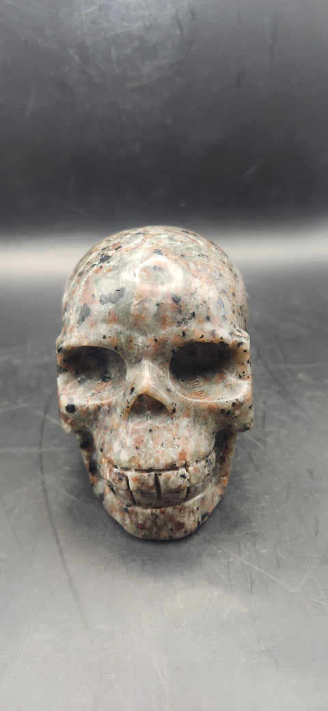 Flame stone "yooperlite" skull! 3 inchs tall, 3 long, 14 ounces