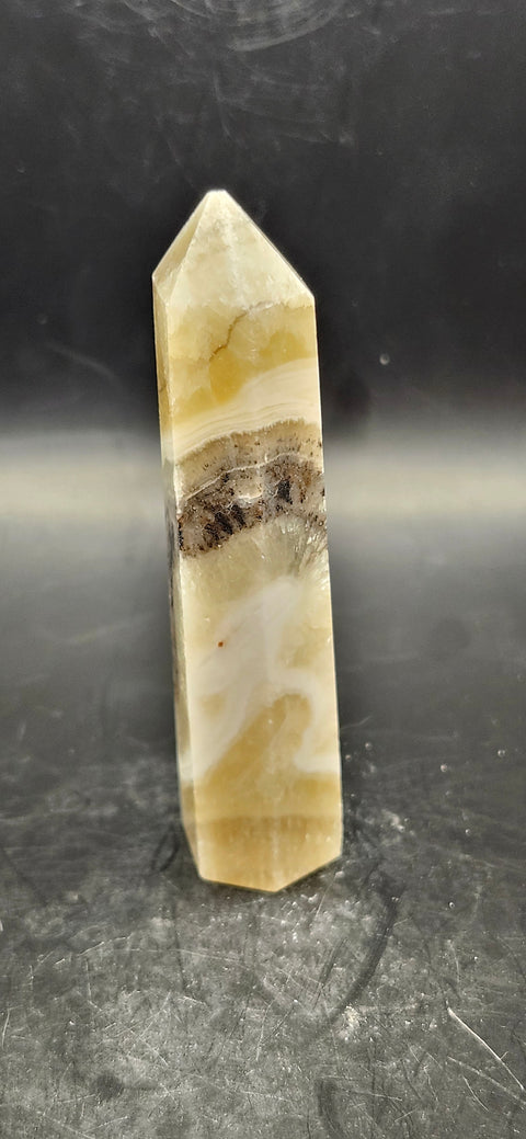 Striped yellow calcite tower! 2 ounces, 3.25 inches