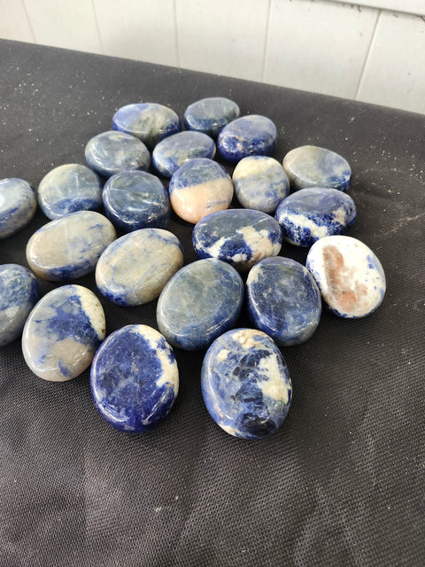 1.5 ounce, 1.75 inch sodalite palm stone uv reactive