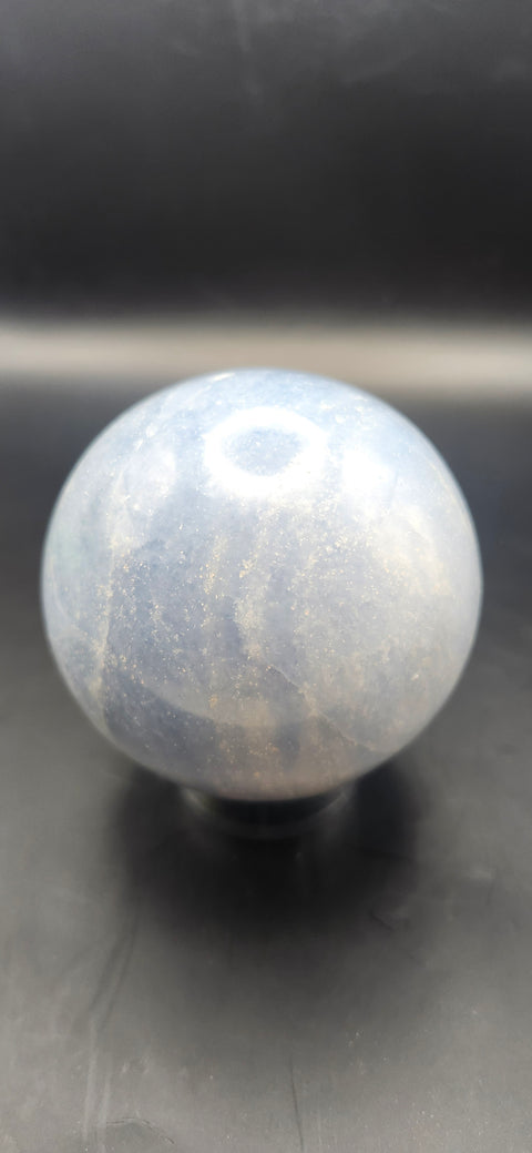 Blue calcite sphere. 62mm, 2.44 inches, 12 ounces
