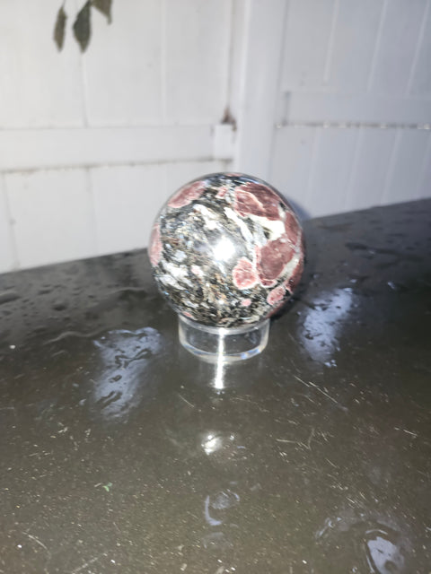 1.5 pound, 69.6mm, 2.74 inch Astrophyllite garnet fireworks sphere