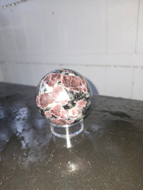 1.5 pound, 69.6mm, 2.74 inch Astrophyllite garnet fireworks sphere