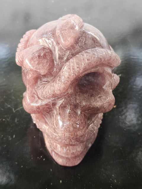 Strawberry quartz skull & snake! 1.6 pounds, 3.9 inches long, 3.3 tall, 2.7 wide