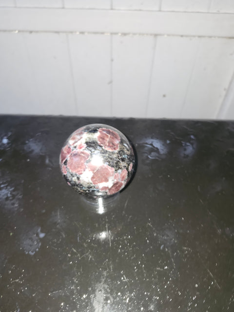 1.5 pound, 69.6mm, 2.74 inch Astrophyllite garnet fireworks sphere
