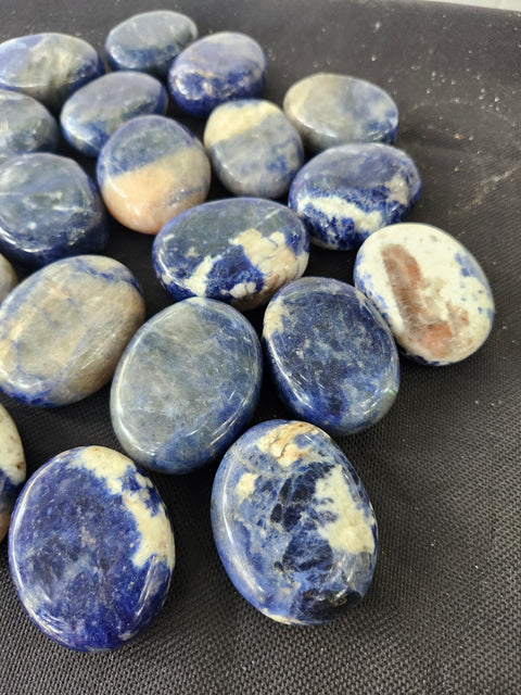 1.5 ounce, 1.75 inch sodalite palm stone uv reactive