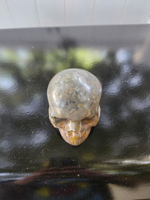 Fruit jasper skull, 1.3 pounds, 3.75 inches long, 3 inches tall, 2.5 inches wide