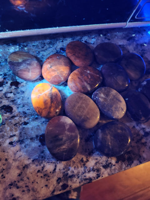 1.5 ounce, 1.75 inch sodalite palm stone uv reactive