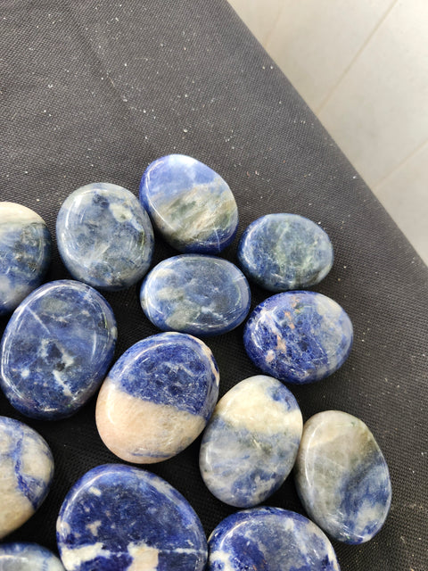 1.5 ounce, 1.75 inch sodalite palm stone uv reactive