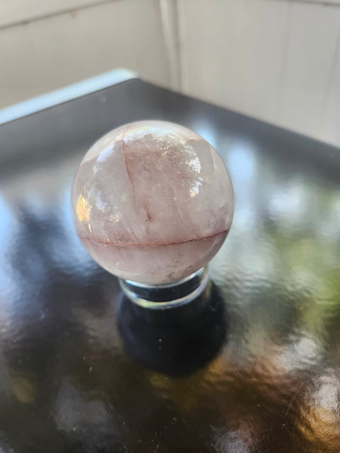 13 ounce, 64mm, 2.52 inch ferruginous quartz sphere