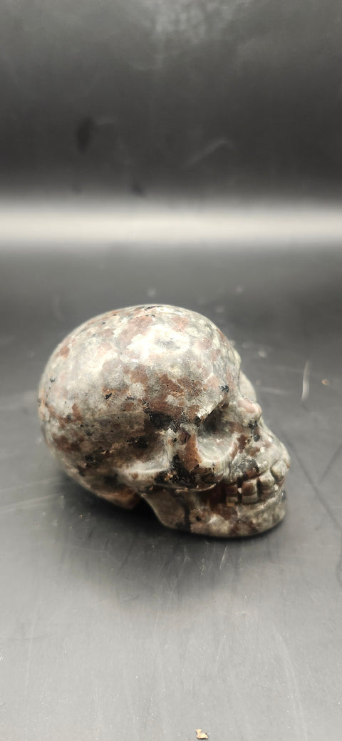 Mini flame stone skull. 5 ounces, 2.5 inches