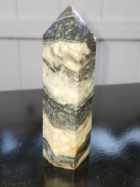 Striped calcite tower! 5.1 inches tall, 10 ounces