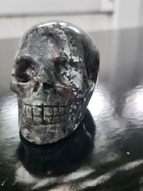Mini flame stone skull! 5.8 ounces, 2.7 inches long, 2.1 tall