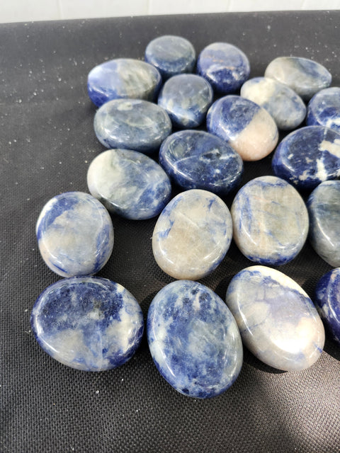 1.5 ounce, 1.75 inch sodalite palm stone uv reactive