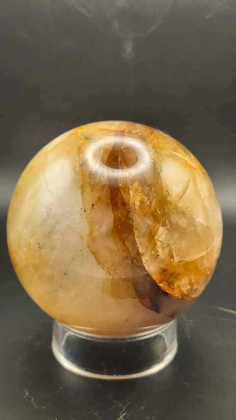 Ferruginous quartz sphere. 71.6mm, 2.82 inches, 1.2 pounds