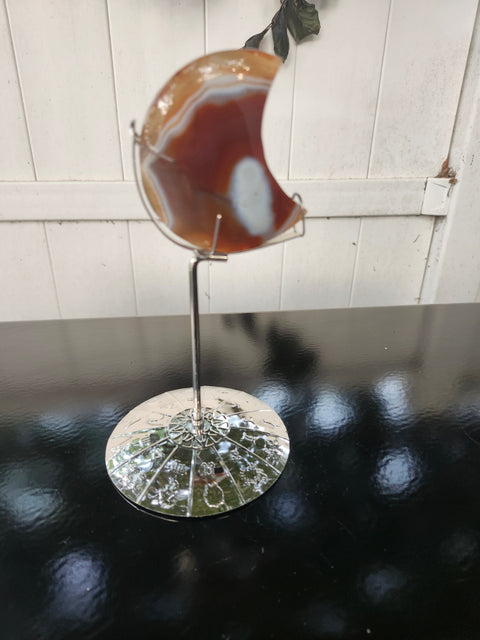 5.4 ounce carnelian moon with zodiac stand