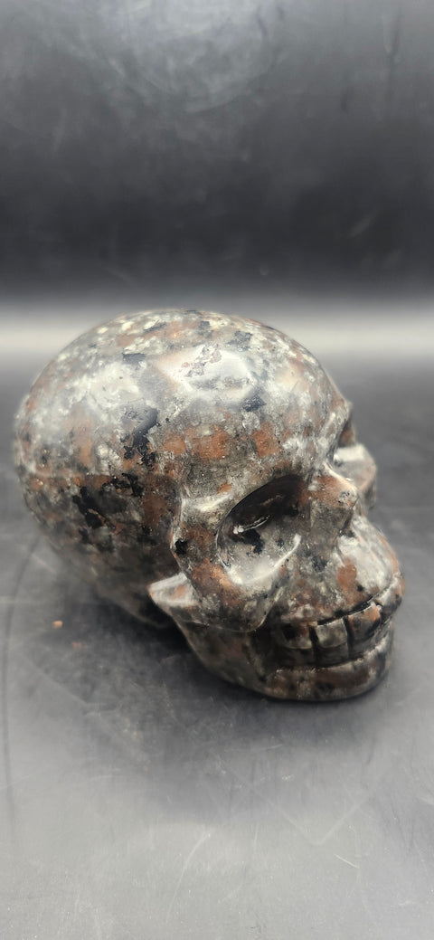 Flame stone "yooperlite" skull!! 3 inches tall, 3 long, 15 ounces