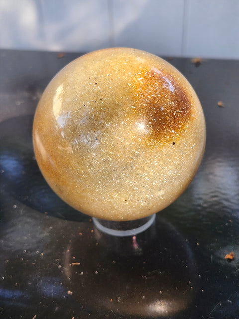 Green and gold aventurine sphere with silver flash 1.4 pounds, 74mm
