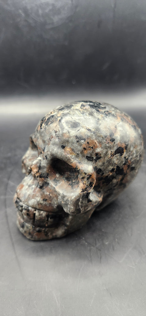 Flame stone "yooperlite" skull! 3 inches tall, 3 long, 14 ounces