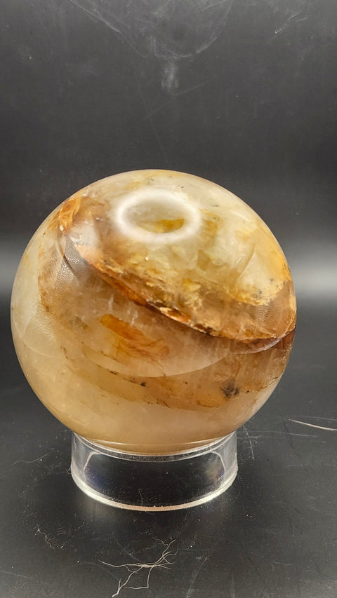 Ferruginous quartz sphere. 71.6mm, 2.82 inches, 1.2 pounds