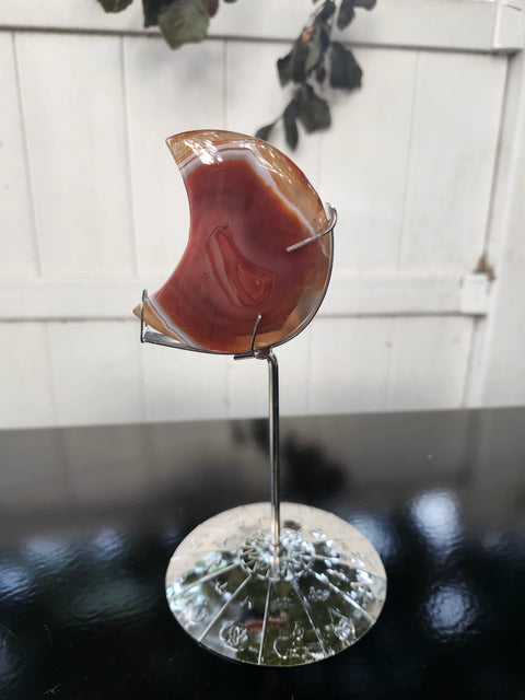 5.4 ounce carnelian moon with zodiac stand