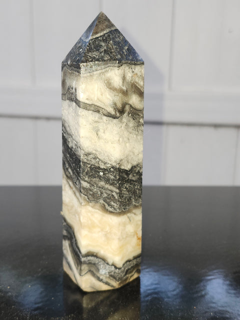 Striped calcite tower! 5.1 inches tall, 10 ounces