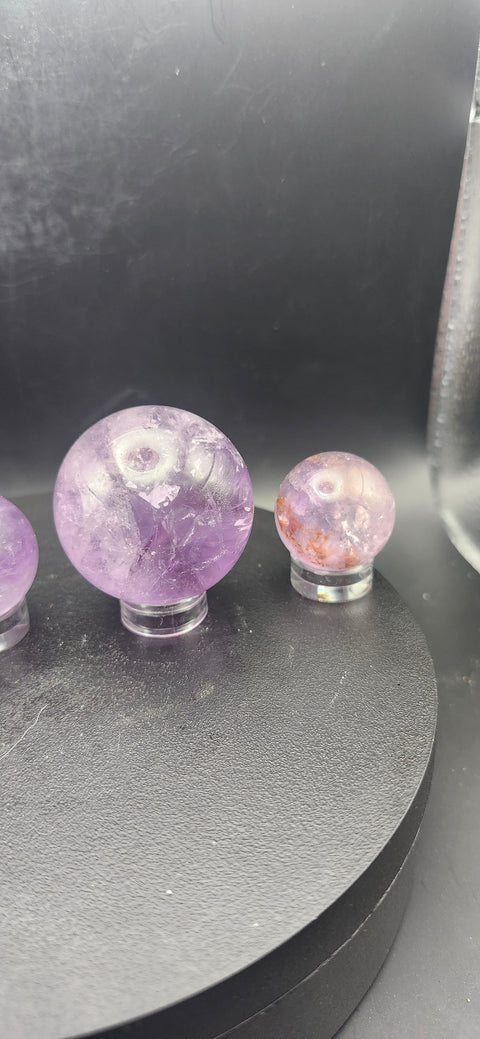 Amethyst quartz spheres set of 2. 1.3 inch and .9 inch