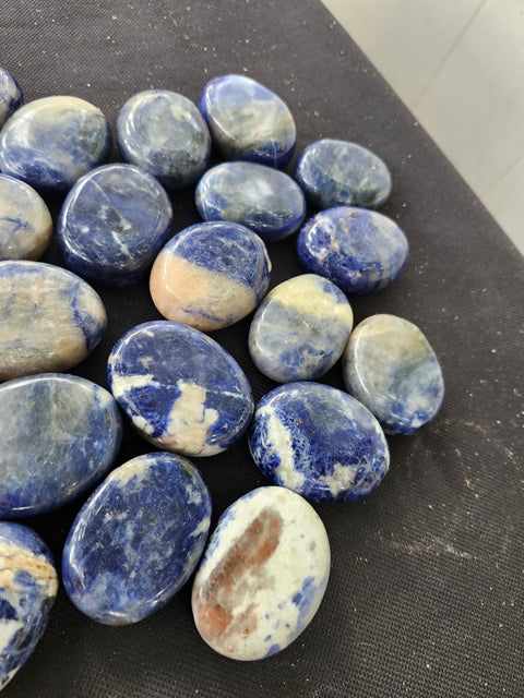 1.5 ounce, 1.75 inch sodalite palm stone uv reactive