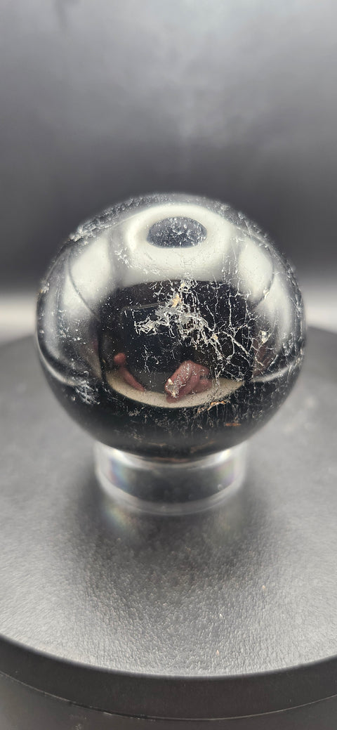 Black tourmaline sphere. 49.8mm, 1.96 inches, 7 ounces