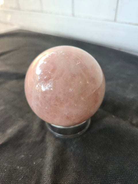 12 ounce, 63.4mm, 2.5 inch rose quartz sphere