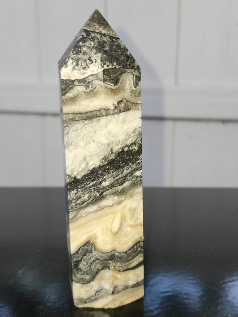 Striped calcite tower! 5.1 inches tall, 10 ounces