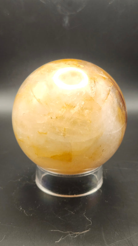 Ferruginous quartz sphere. 71.6mm, 2.82 inches, 1.2 pounds