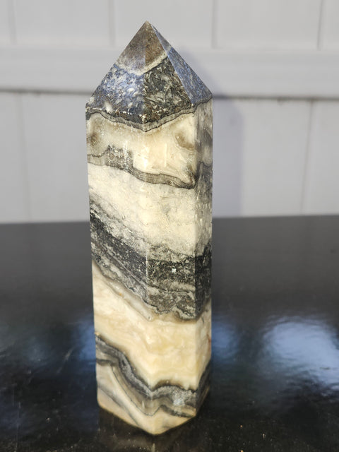 Striped calcite tower! 5.1 inches tall, 10 ounces