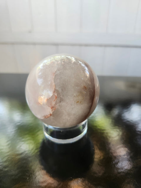 13 ounce, 64mm, 2.52 inch ferruginous quartz sphere