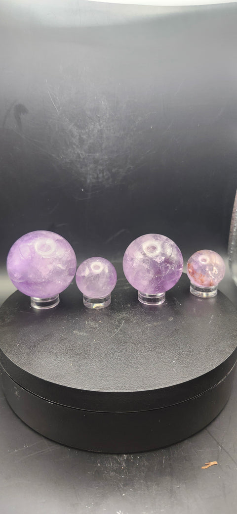 Amethyst quartz spheres set of 2. 1.3 inch and .9 inch