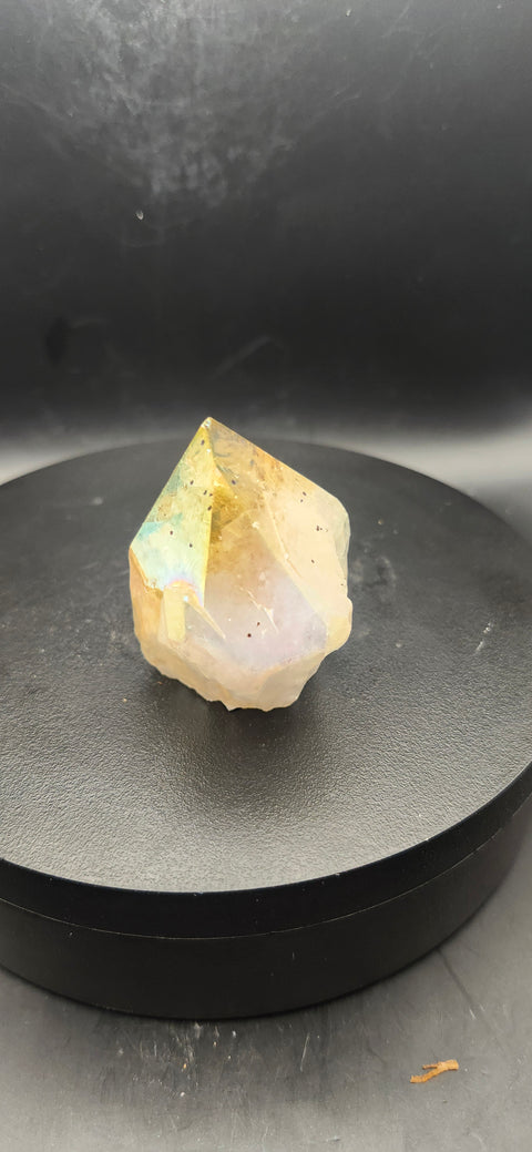 Angel aura citrine polished top point. 2 ounces