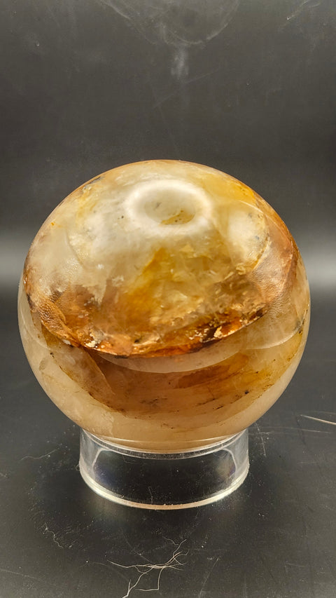 Ferruginous quartz sphere. 71.6mm, 2.82 inches, 1.2 pounds