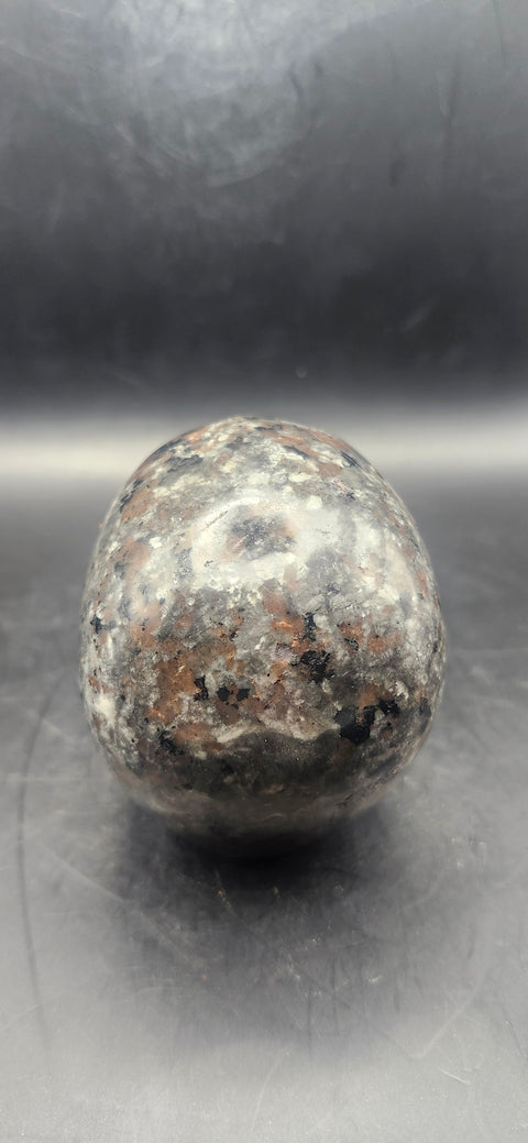 Flame stone "yooperlite" skull!! 3 inches tall, 3 long, 15 ounces