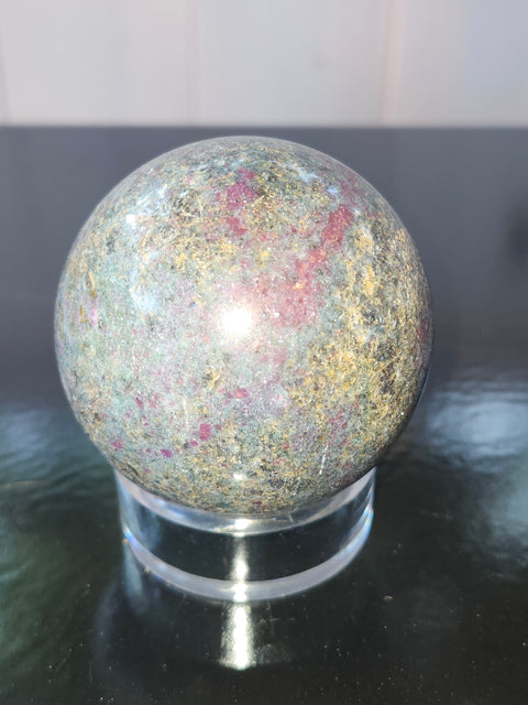 13 ounce ruby in kyanite sphere!! Uv reactive, 58 mm,2.3 inches