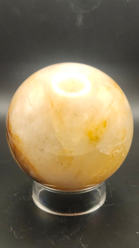 Ferruginous quartz sphere. 71.6mm, 2.82 inches, 1.2 pounds