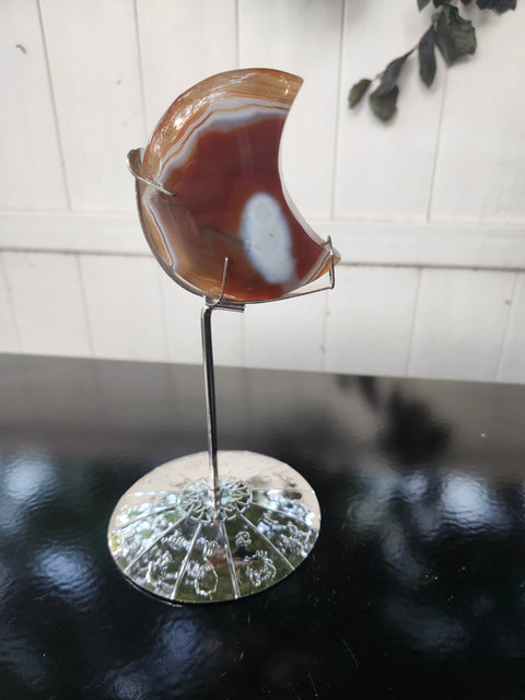 5.4 ounce carnelian moon with zodiac stand