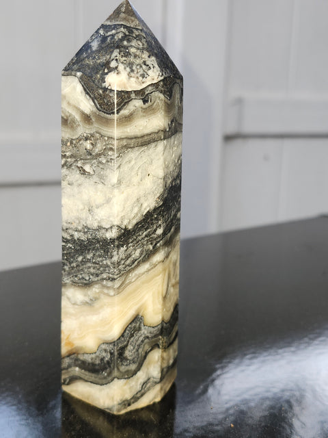 Striped calcite tower! 5.1 inches tall, 10 ounces