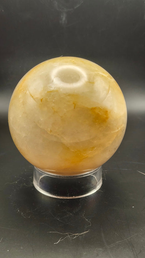 Ferruginous quartz sphere. 71.6mm, 2.82 inches, 1.2 pounds