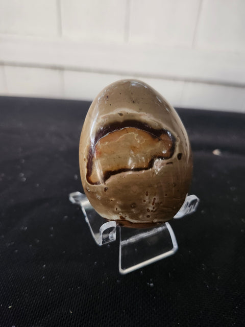 5 ounce, 2.75 inch polychrome jasper palm stone