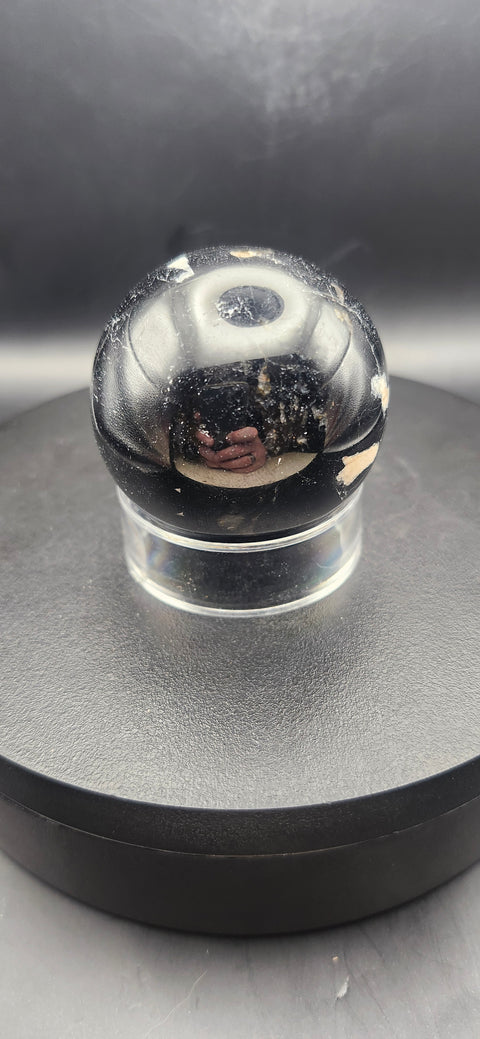 Black tourmaline sphere. 49.6mm, 1.95 inches, 7 ounces
