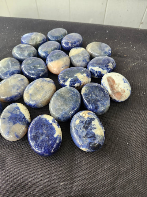 1.5 ounce, 1.75 inch sodalite palm stone uv reactive