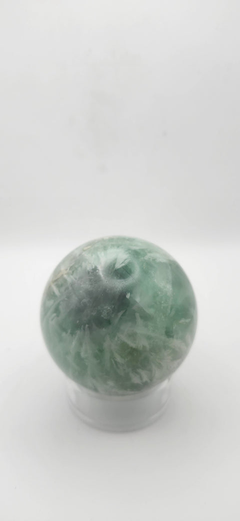 Snowflake florite sphere. 59.6mm, 2.34 inches, 12.4 ounces
