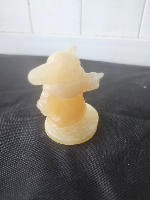 4.4 ounce, 2.75 inch orange calcite yoda